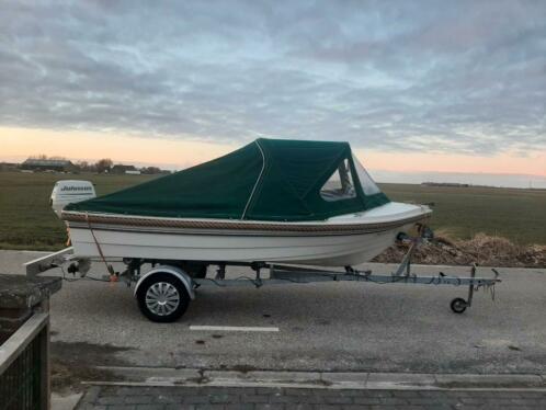 Prachtige sloep met buiskap, 15pk 4 takt en trailer.