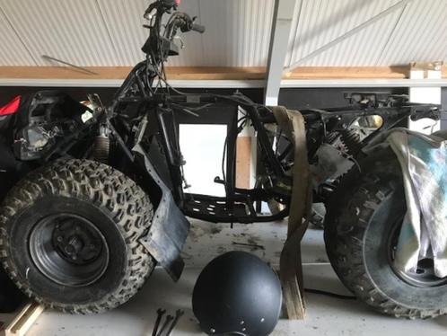 quad met kapotte motor