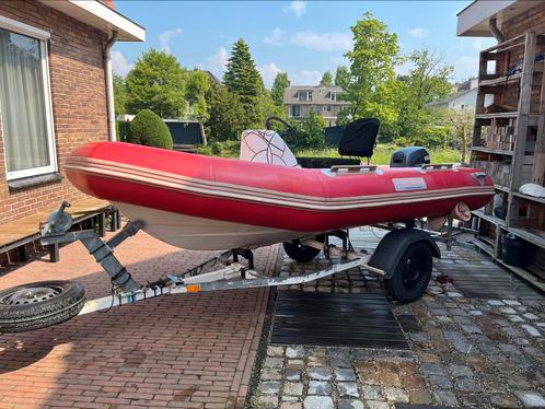 Rib met 15 pk Yamaha 4T en kanteltrailer.