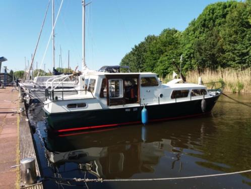 Rijo kruiser GSAK 9.80 m. Werfgebouwde motorkruiser uit 1974