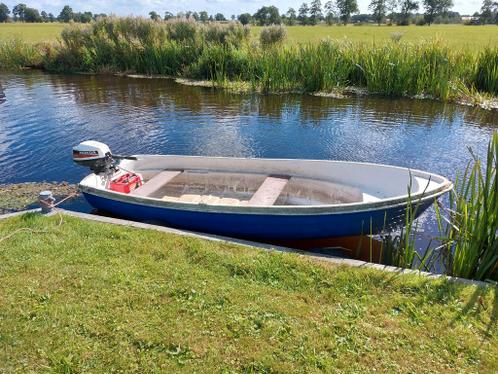 Roeibootje met 4 takt 5 pk Honda