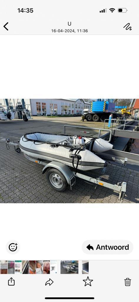 Rubber bijboot met bb motor en trailer