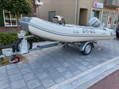 Rubberboot met 30 PK buitenboordmotor