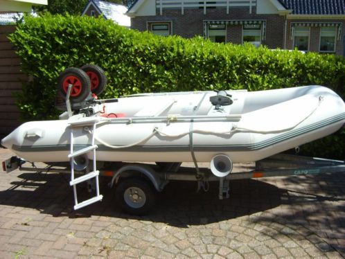 Rubberboot met 6 pk suzuki en trailer CapoPega