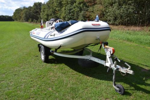 Rubberboot met Motor 15pk  wegtrailer NIEUWSTAAT 2014