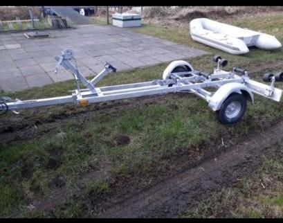 Rubberboot met trailer en 4pk johnson