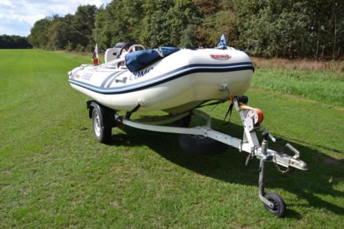 Rurbberboot met Motor 15pk  wegtrailer NIEUWSTAAT 2014