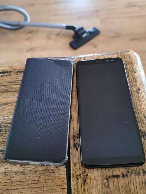 Samsung galaxy A8 2018 duos 32GB als nieuw  2 hoesjes