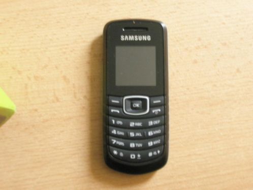 Samsung GT-E1080W mobiele telefoon met adapter