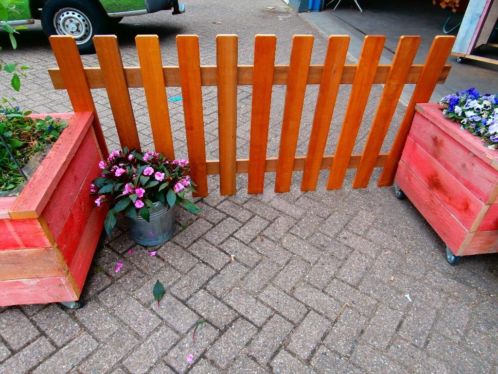 schuttingen tuin hekken pallen hardhout