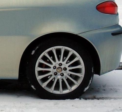 Set originele Alfa Romeo 16034 velgen met winterbanden 