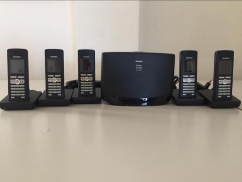 Siemens met isdn en 5 headsets