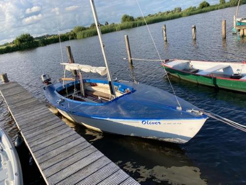 Spanker zeilboot  buitenboordmotor en trailer