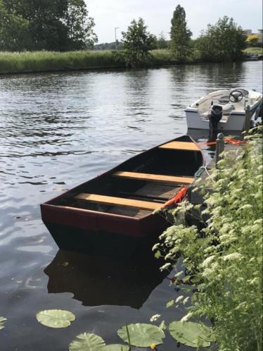 Stalen boot met 4 Pk Suzuki 2-takt