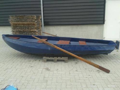 Stalen roeiboot met 4pk