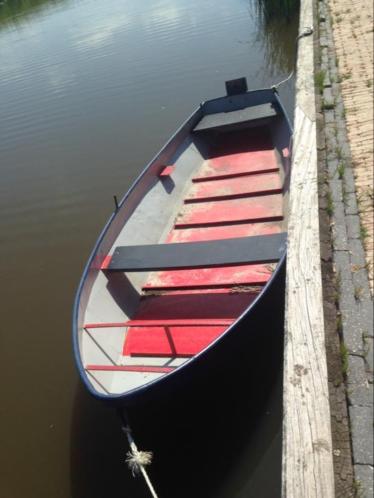 Stalen roeiboot  schouw