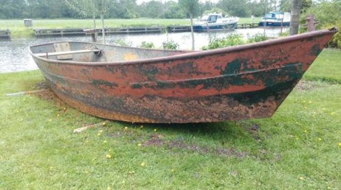 Stalenschouw sloepvlet grachtenboot roeiboot met roeispane