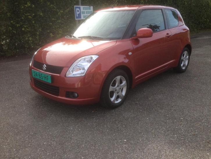 Suzuki 1.3 GL 3 Drs Oranjerood Full option Airco