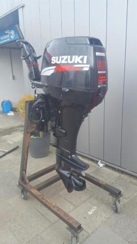 SUZUKI 50 pk 4 TAKT EFI LANGSTAART POWERTIM OP STUURKNUPPEL