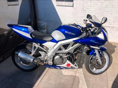 Suzuki SV650S blauwparelmoerwit dik geluidamphoger stuur