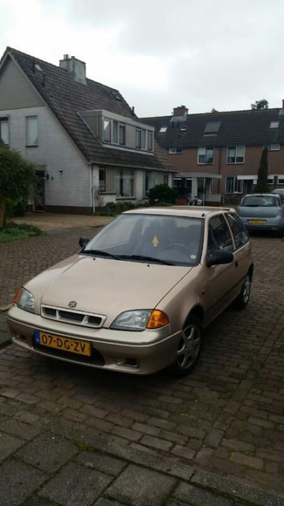 Suzuki Swift 1.3 1999 Grijs airco  electr ramen