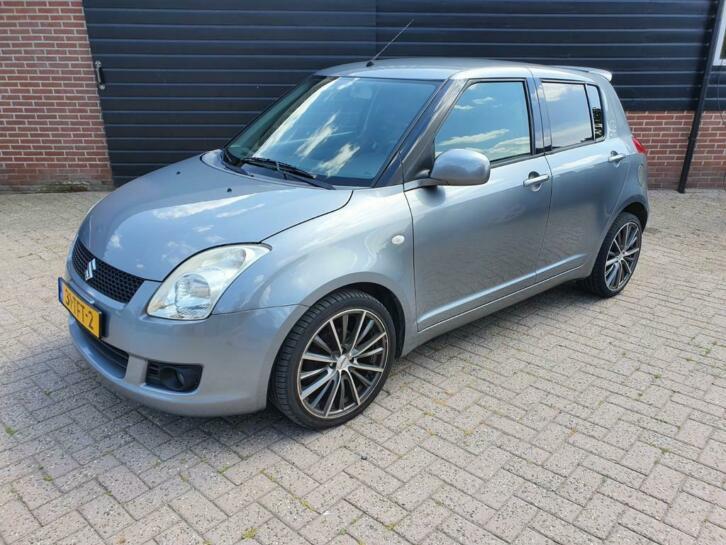 Suzuki Swift 1.3 5Deurs LMV, airco, leren bekleding.