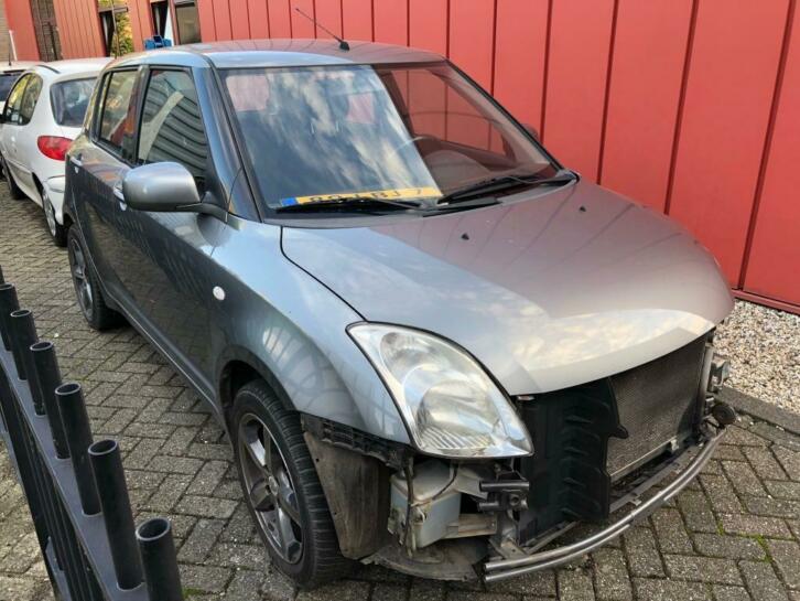 Suzuki Swift 1.3 Benzine 2011 5drs schade