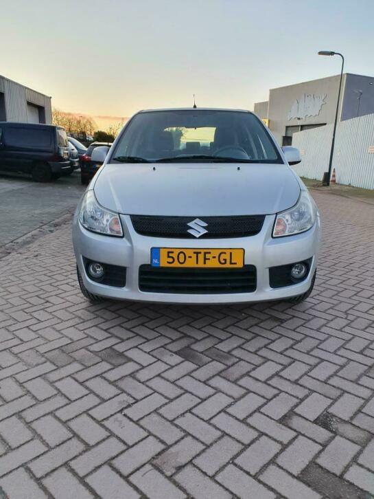 Suzuki SX4 GRIJS