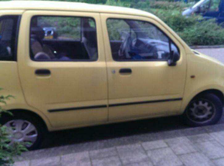 Suzuki Wagon R 1.3 2002 Geel met bumperschade