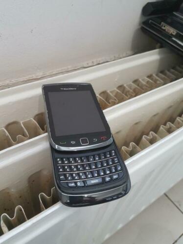 Te koop goed werkende BlackBerry torch touch met oplader