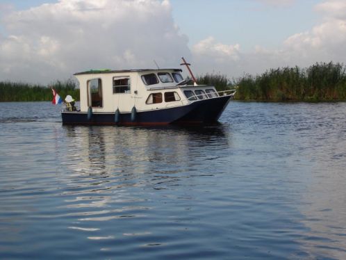 Te koop stalen kajuitboot