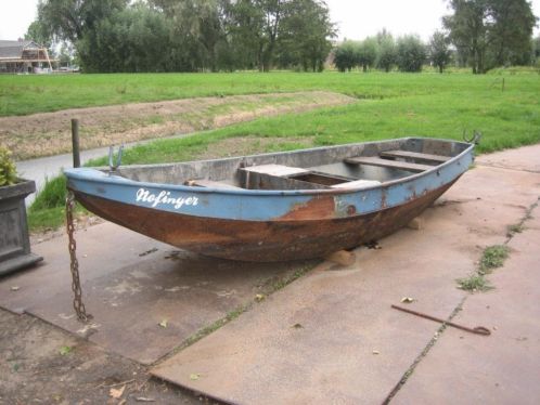 Te koop stalen roeiboot