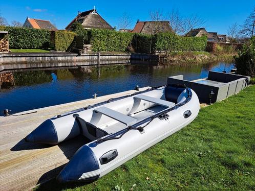 Te koop vrijwel nieuwe rubberboot 3.20 met aluminium bodem