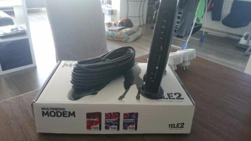 Tele2 modem (tot 20 Mb), 2 homeplugs en kabels