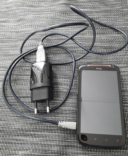 TELEFOON Mobieltje HTC compleet met adapter.