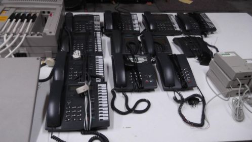 telefoonscentrale met 11 telefoons samsung en siemens