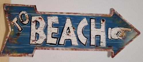 To beach naar strand pijl relief reclamebord van metaal