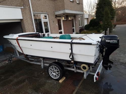 Tourboot met zgan motor en trailer