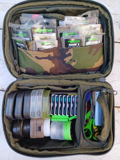 Trakker Camou Rigbag vol Korda materiaal