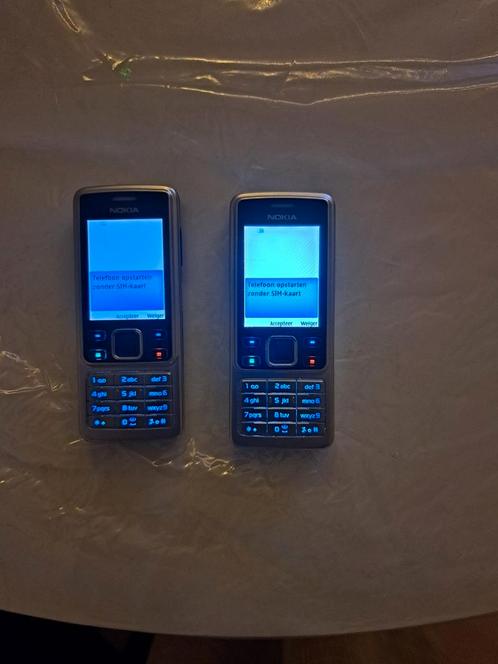 Twee mobiele telefoons nokia (6300)
