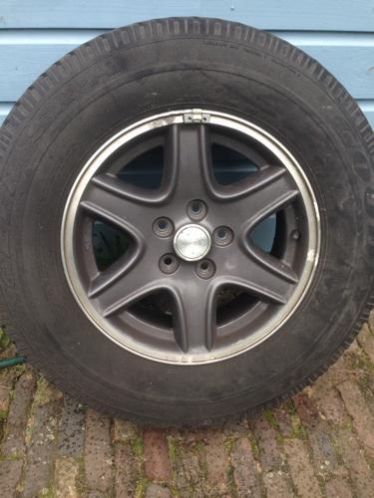 Vier 16 inch Jeep-velgen met MS banden