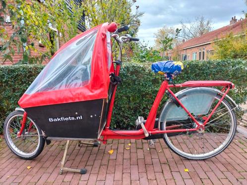 Vrolijke bakfiets van kwaliteitmerk van Andel Amsterdam