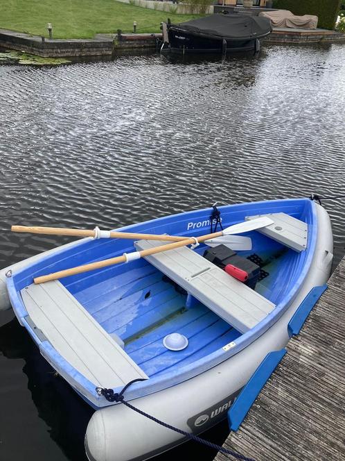 Walkerbay 8 met roeispanen en electro motor