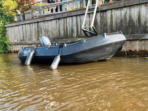 Whaly 310 zwart met Yamaha 6 pk