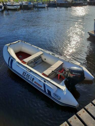 Zeer nette rubberboot met 15pk buitenboordmoter