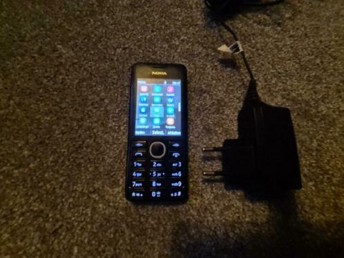 Zwarte mobiele telefoon Nokia, Model 206.1, wekt goed